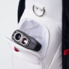 Secure rangefinder pocket with magnetic holder for quick access